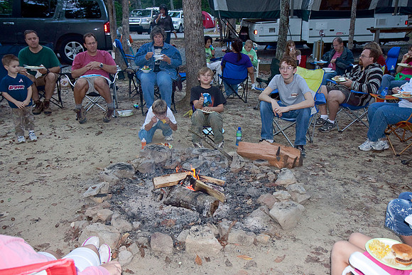 Potluck dinner around the campfire