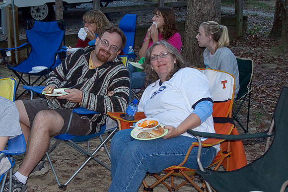 Potluck dinner around the campfire